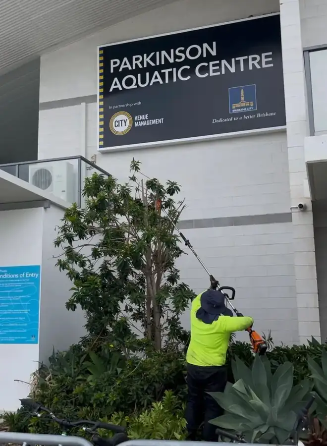 OnTime Landscape & Tree Maintenance carrying out hedging work in Slacks Creek