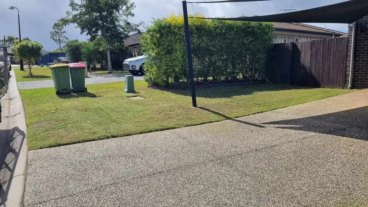 The OnTime crew on a lawn mowing job in Calamvale
