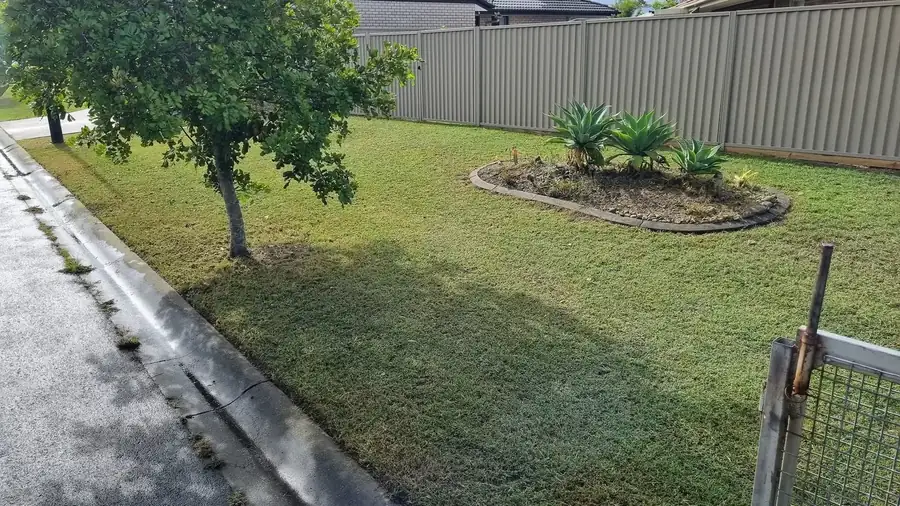 OnTime Landscape & Tree Maintenance carrying out lawn mowing work in Slacks Creek